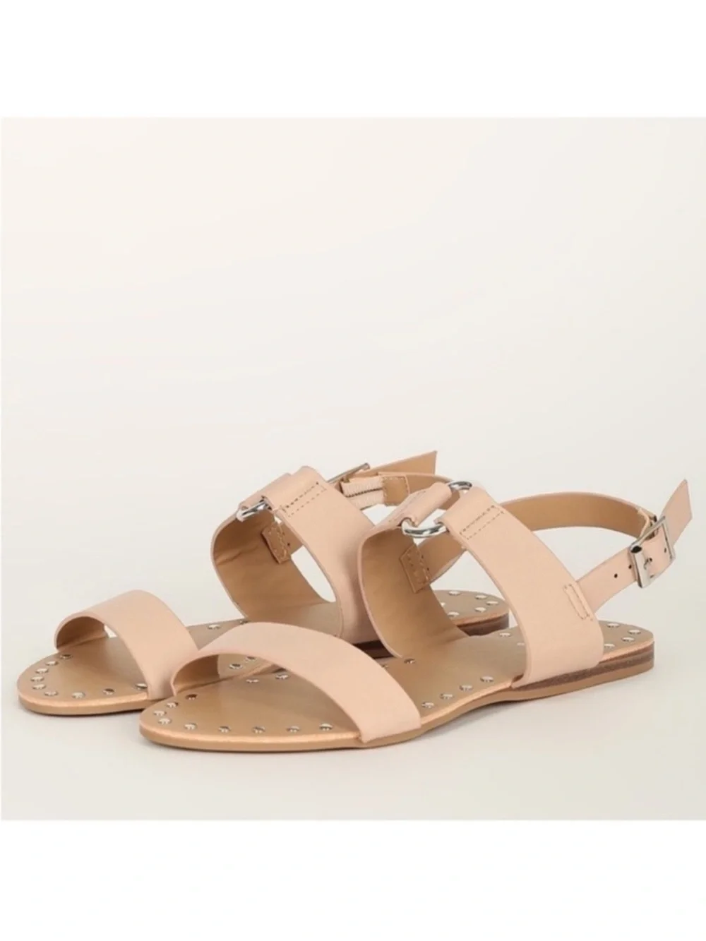 Nude leather studded metal ring accent slingback flat sandals